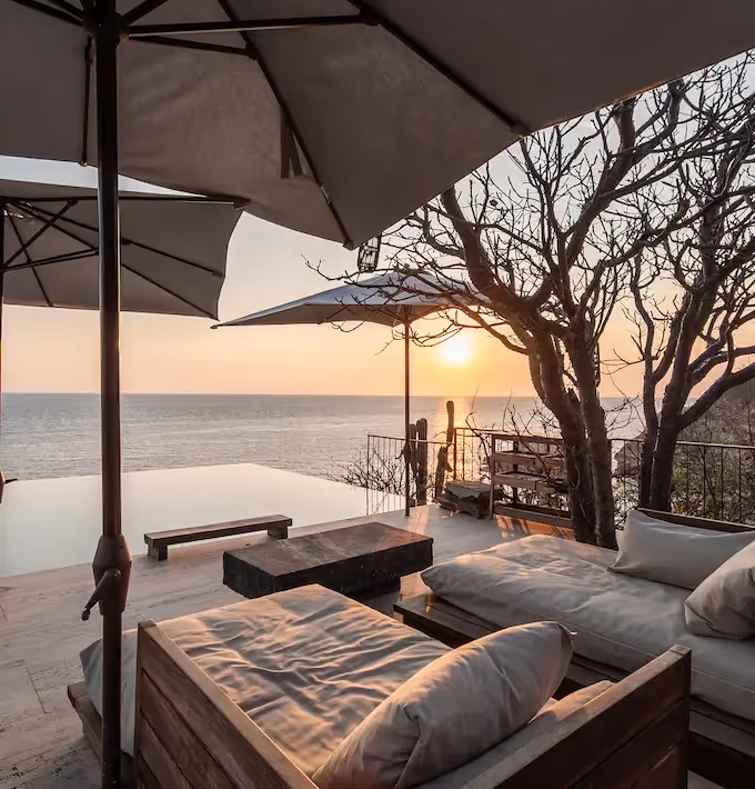 Luxury terrace with sunbeds at La Valise Mazunte Hotel.